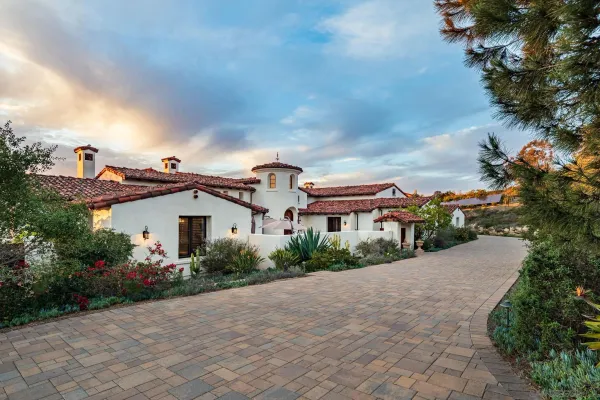 a view of house next to a yard