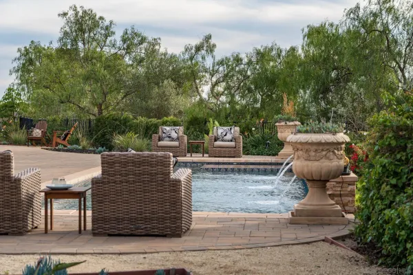 a view of a patio in the backyard