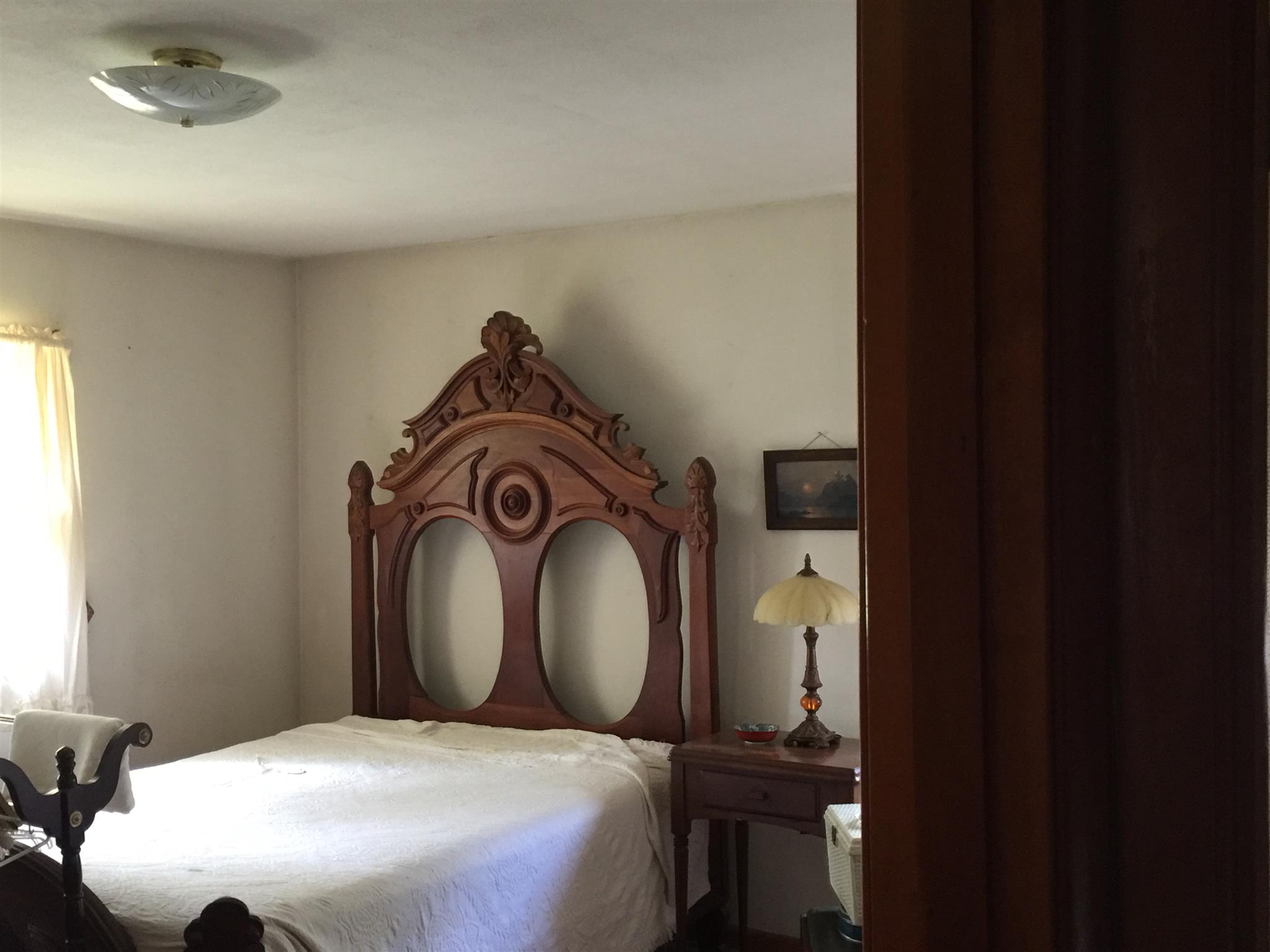164 Chapman Chapel Road Pelham, TN 37366 - Photo 6 of 10 Master bedroom has private bathroom with newer tile.
