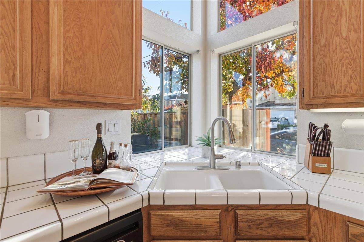29273 Chance Street Hayward, CA 94544 - Photo 14 of 51 a kitchen with a sink and cabinets