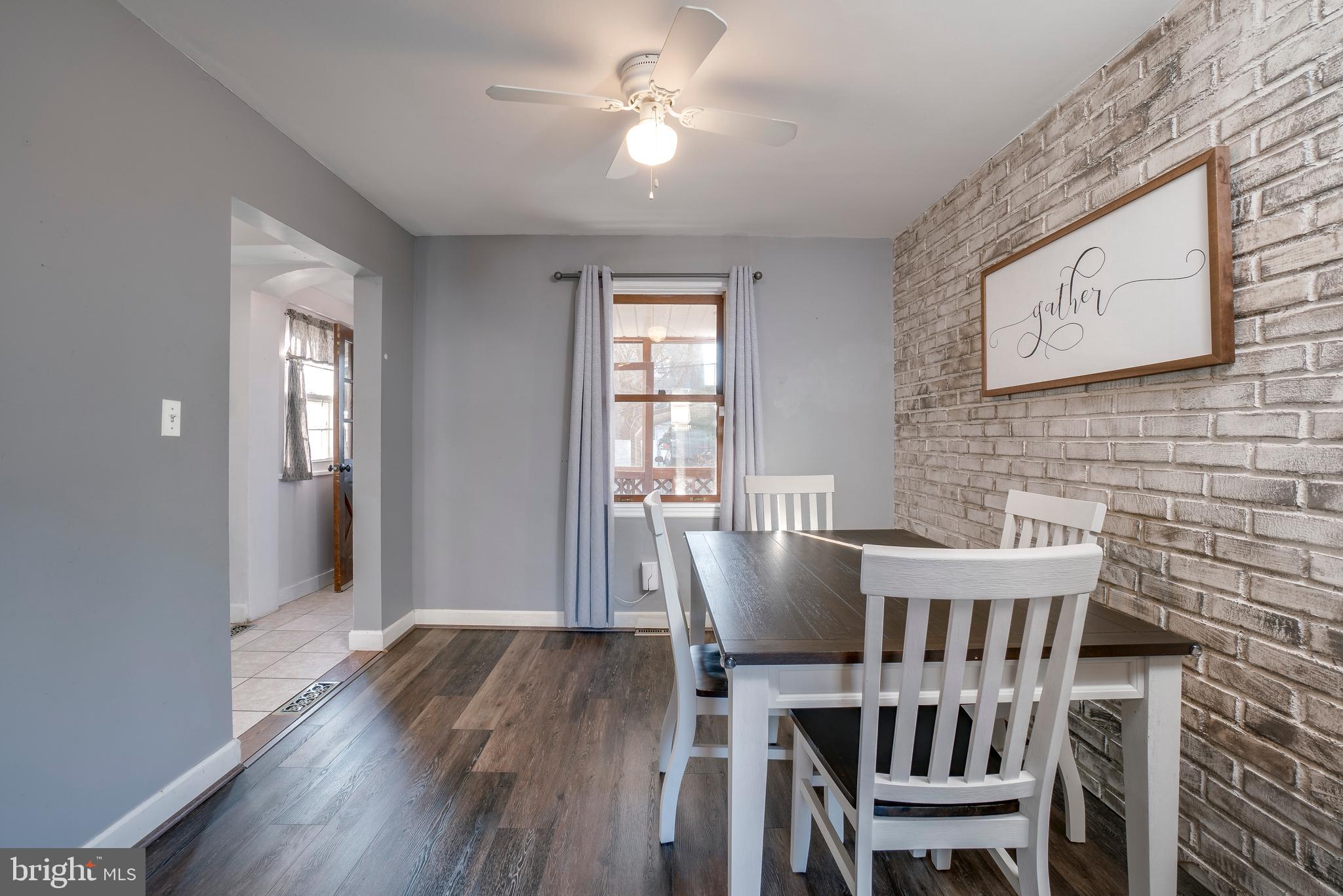 22 Eastship Road Baltimore, MD 21222 - Photo 6 of 28 Dining Room With Updated Engineered Wood Floors