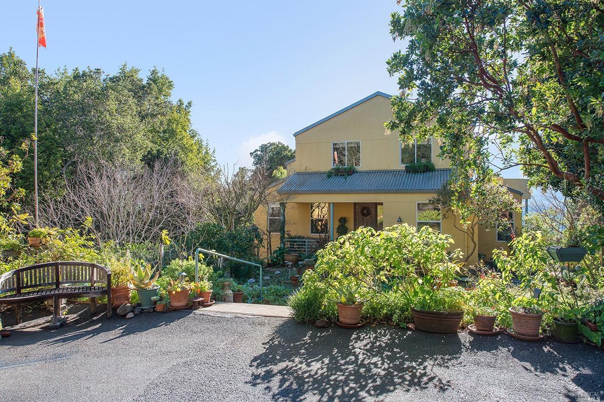 53 Ridge Road Fairfax, CA 94930 - Photo 1 of 1 a front view of a house with garden