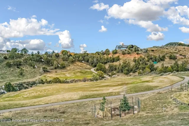 a view of a yard with an ocean beach