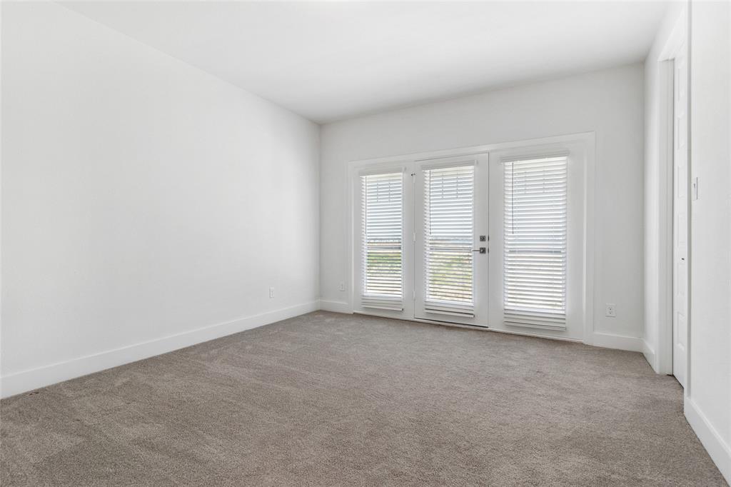 714 Resort Drive Rowlett, TX 75088 - Photo 11 of 30 an empty room with windows