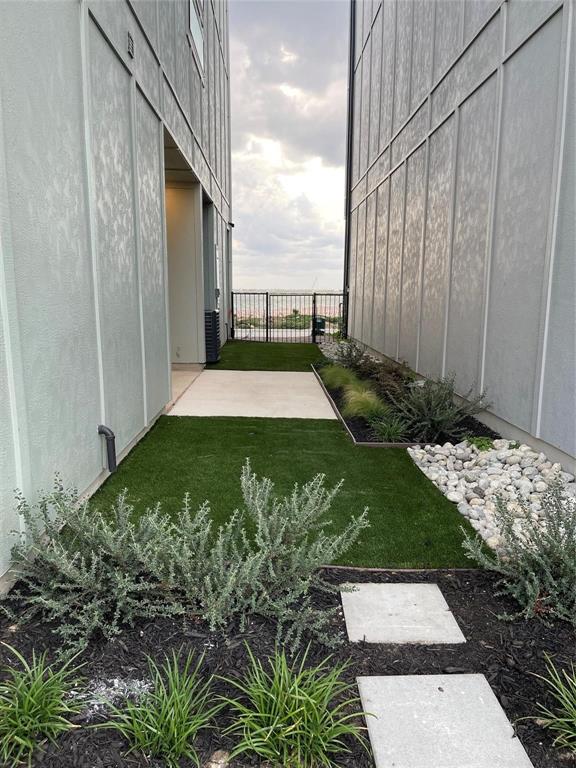 714 Resort Drive Rowlett, TX 75088 - Photo 30 of 30 a view of a backyard with pathway