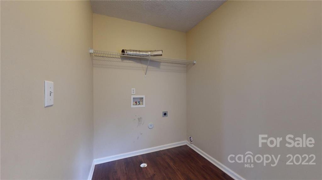 10619 Bedlington Road Charlotte, NC 28278 - Photo 19 of 26 a view of small space with racks on the wall