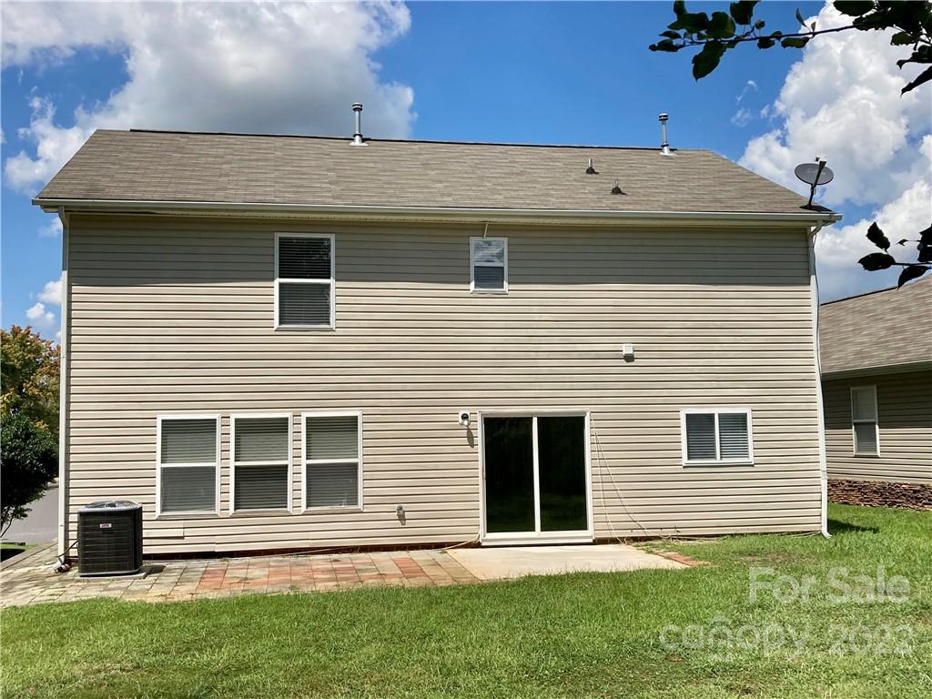 10619 Bedlington Road Charlotte, NC 28278 - Photo 26 of 26 a view of a house with a yard