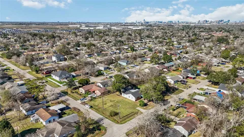 an aerial view of residential building with parking space