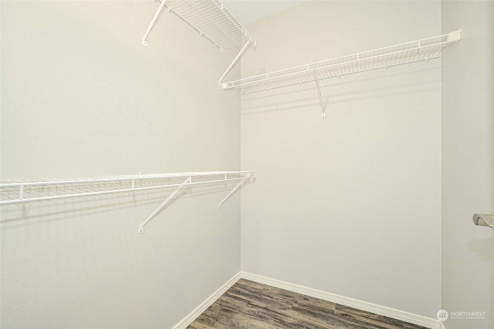 10709 Valley View Road, Unit A303 Bothell, WA 98011 - Photo 14 of 23 a view of a room with racks on the wall