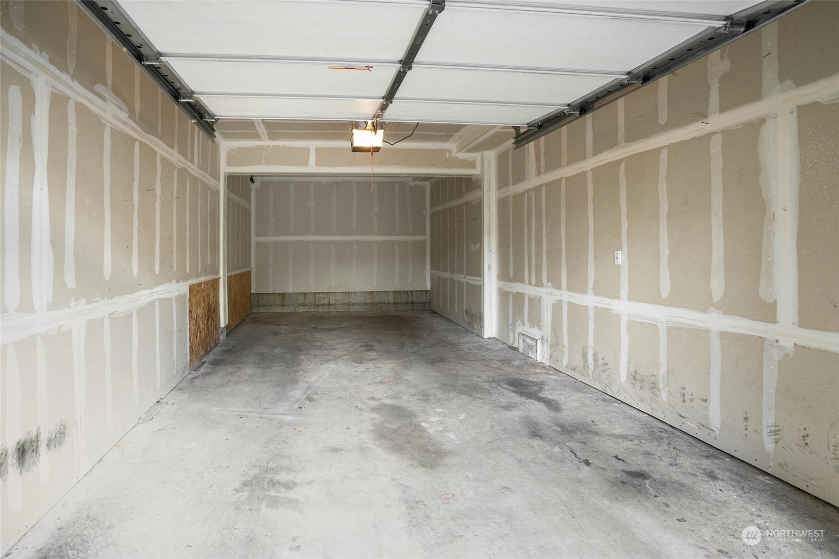 10709 Valley View Road, Unit A303 Bothell, WA 98011 - Photo 21 of 23 a view of an empty room with a window