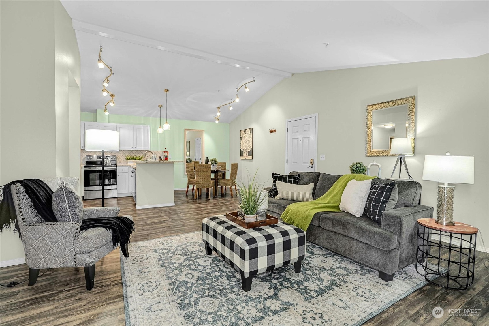10709 Valley View Road, Unit A303 Bothell, WA 98011 - Photo 6 of 23 a living room with furniture and a table
