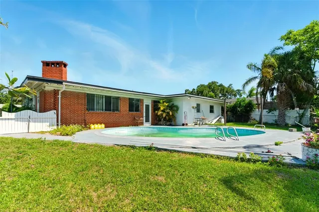 a house view with a garden space