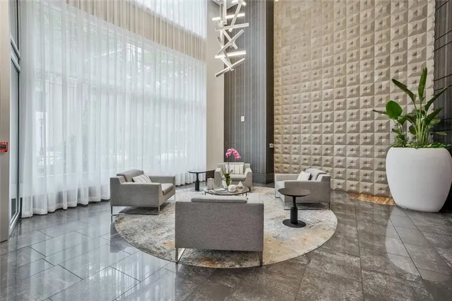 a living room with furniture and a window