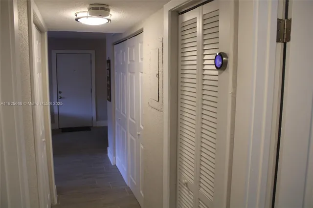 a view of a porch with wooden floor