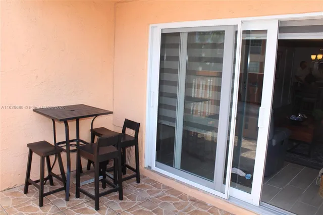 a house view with a backyard space