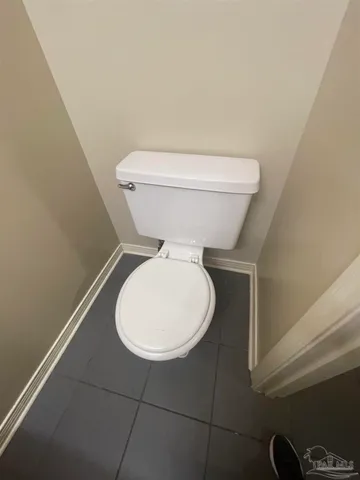 a bathroom with a toilet and a sink