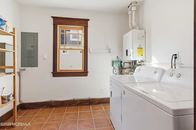 a room with a sink and a mirror