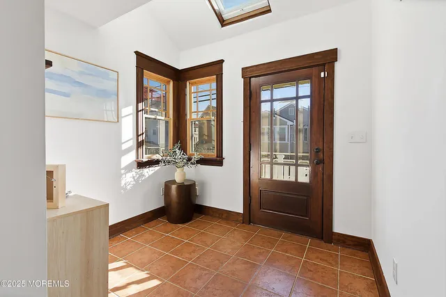 a view of living room and front door