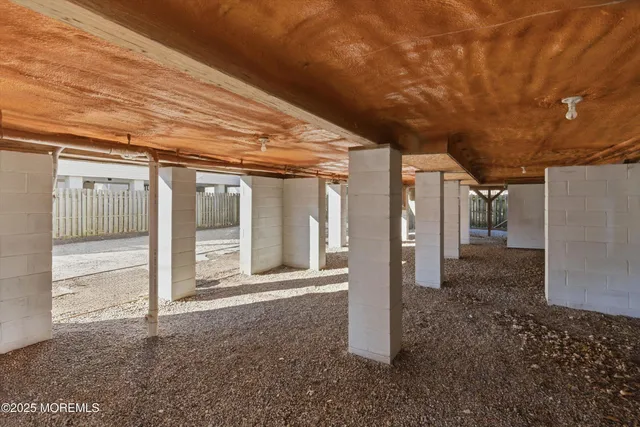 an aerial view of residential building with parking space and parking space