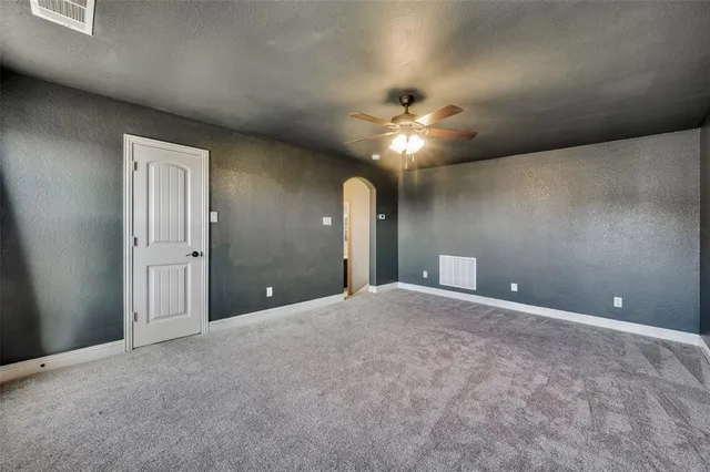 a bathroom with a sink mirror toilet and shower