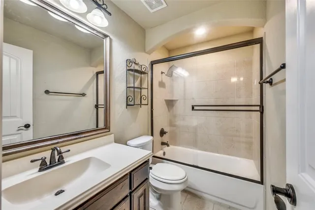 a view of house with yard and entertaining space