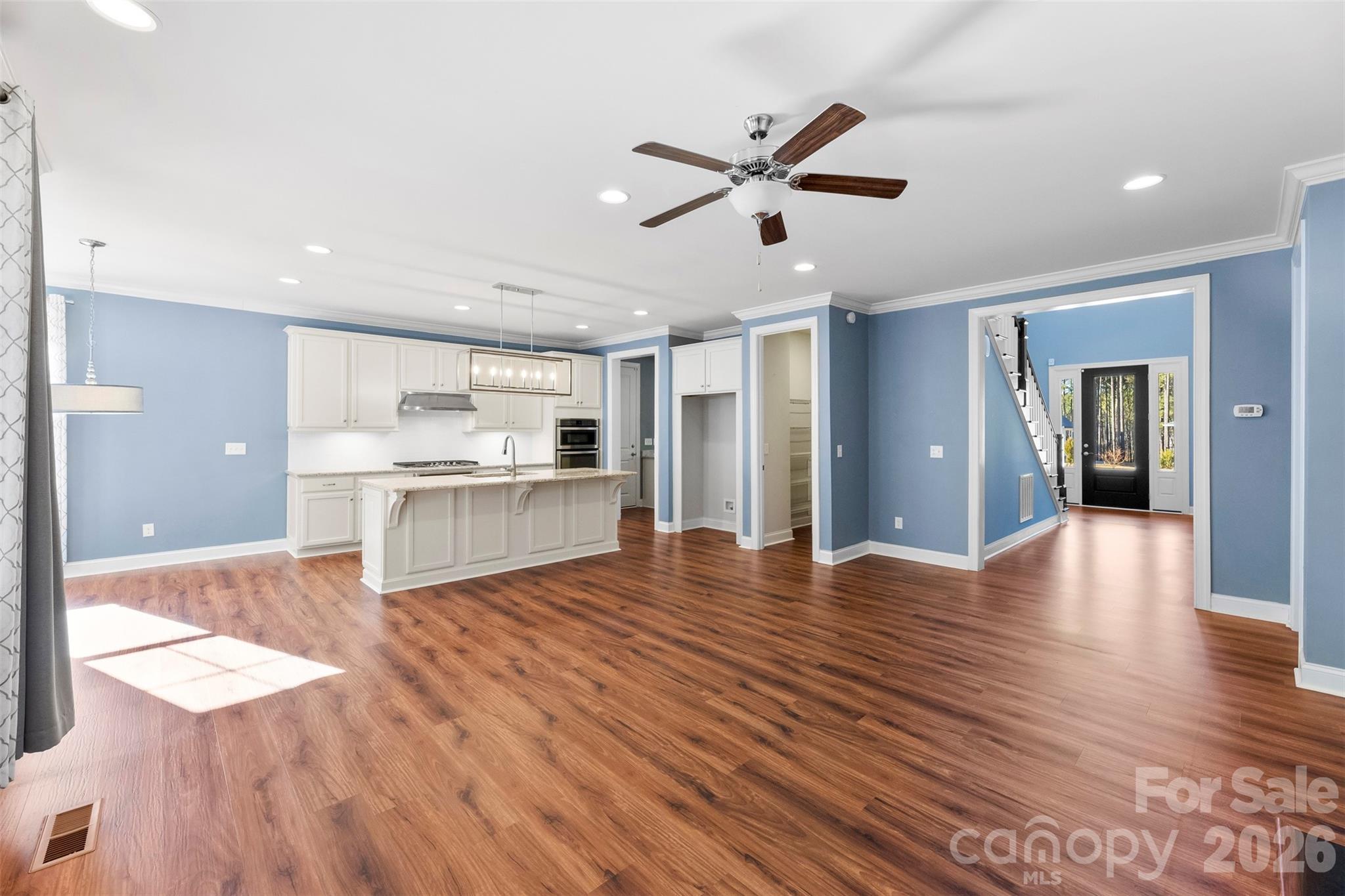 6065 Chimney Bluff Road Lancaster, SC 29720 - Photo 12 of 43 a view of a kitchen with wooden floor and a kitchen