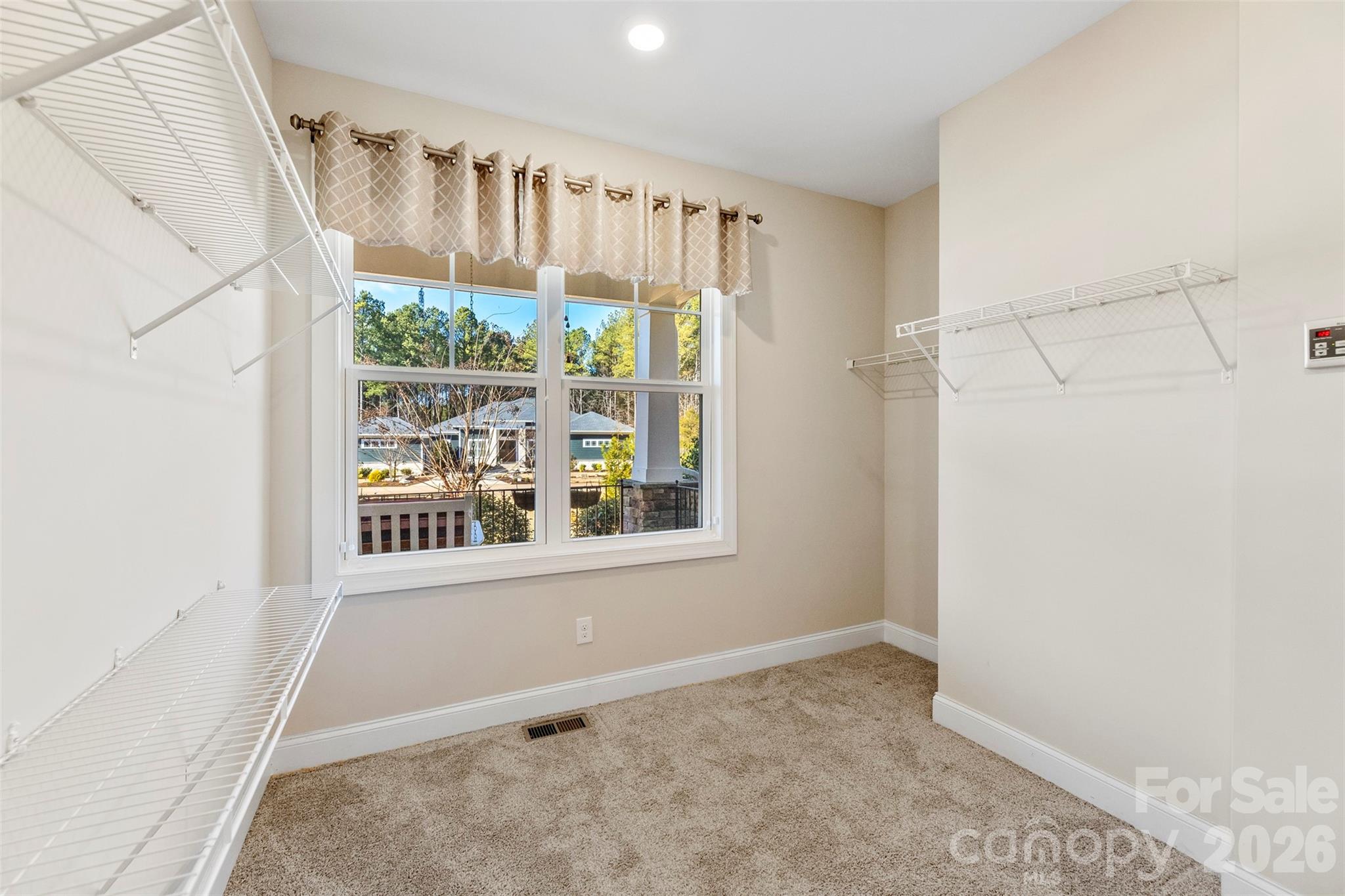 6065 Chimney Bluff Road Lancaster, SC 29720 - Photo 20 of 43 a view of an empty room with a window