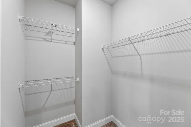 a bathroom with a toilet and a bathtub