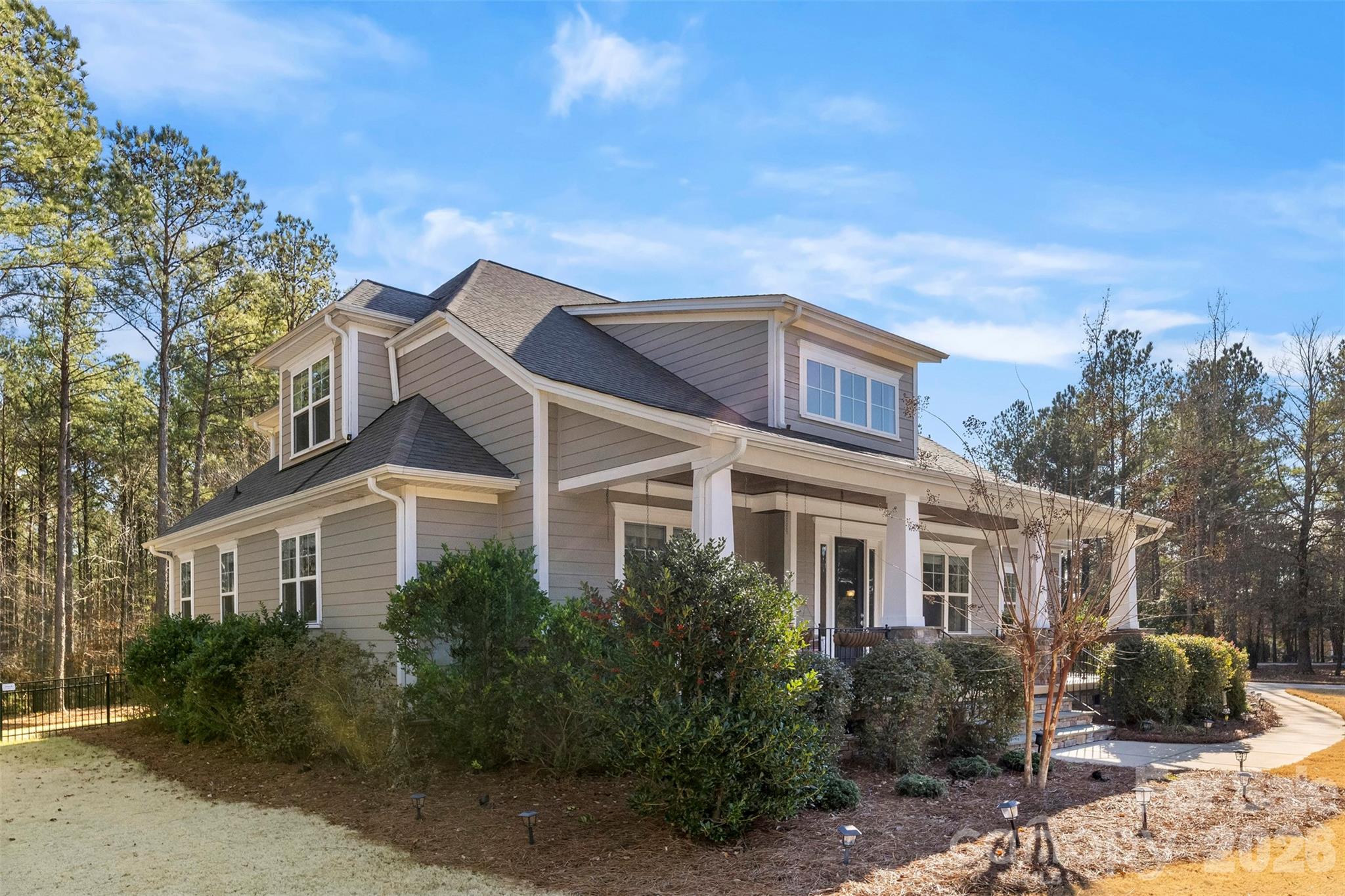 6065 Chimney Bluff Road Lancaster, SC 29720 - Photo 3 of 43 a front view of a house with a yard