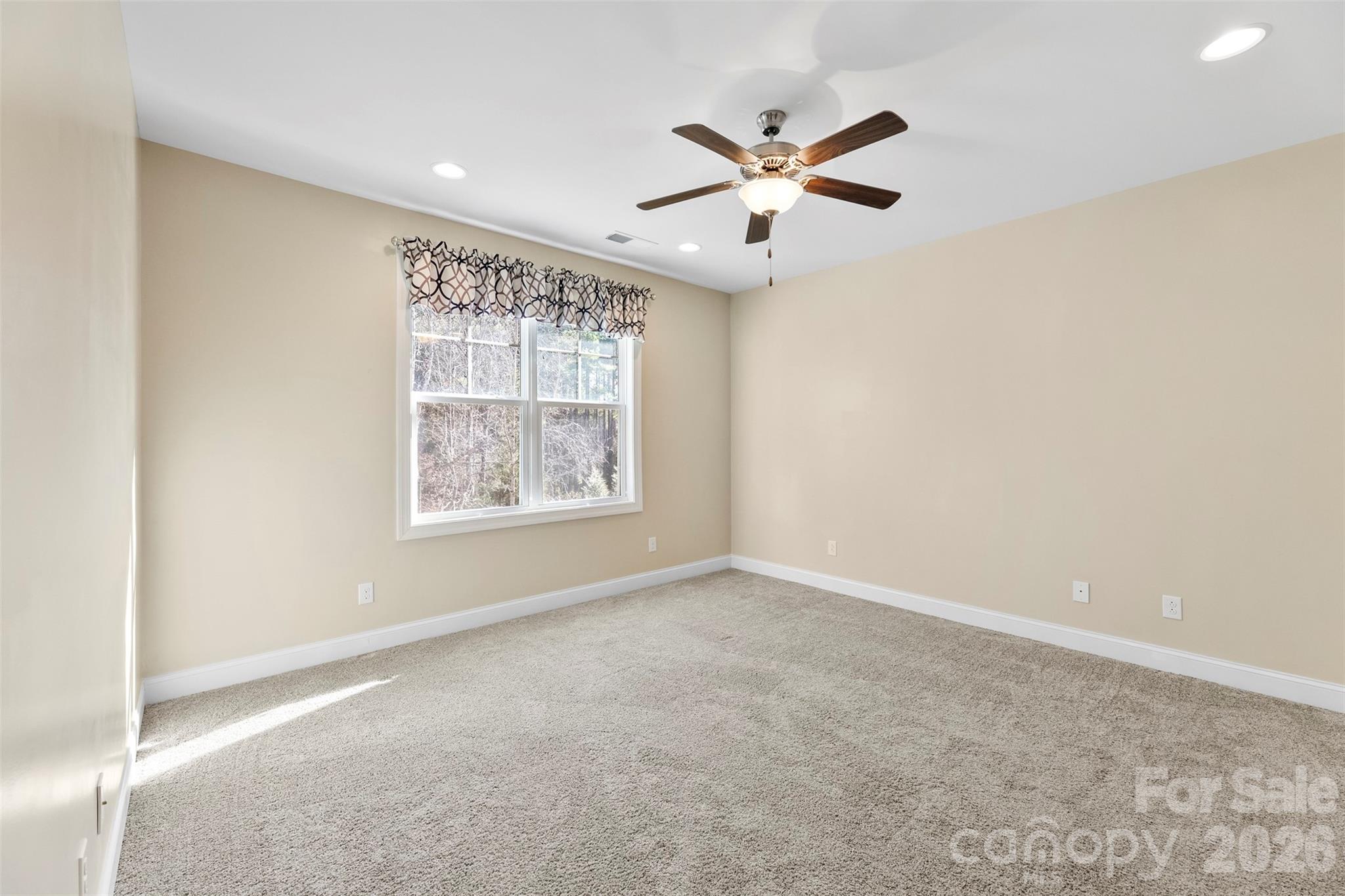 6065 Chimney Bluff Road Lancaster, SC 29720 - Photo 31 of 43 a view of an empty room with a window