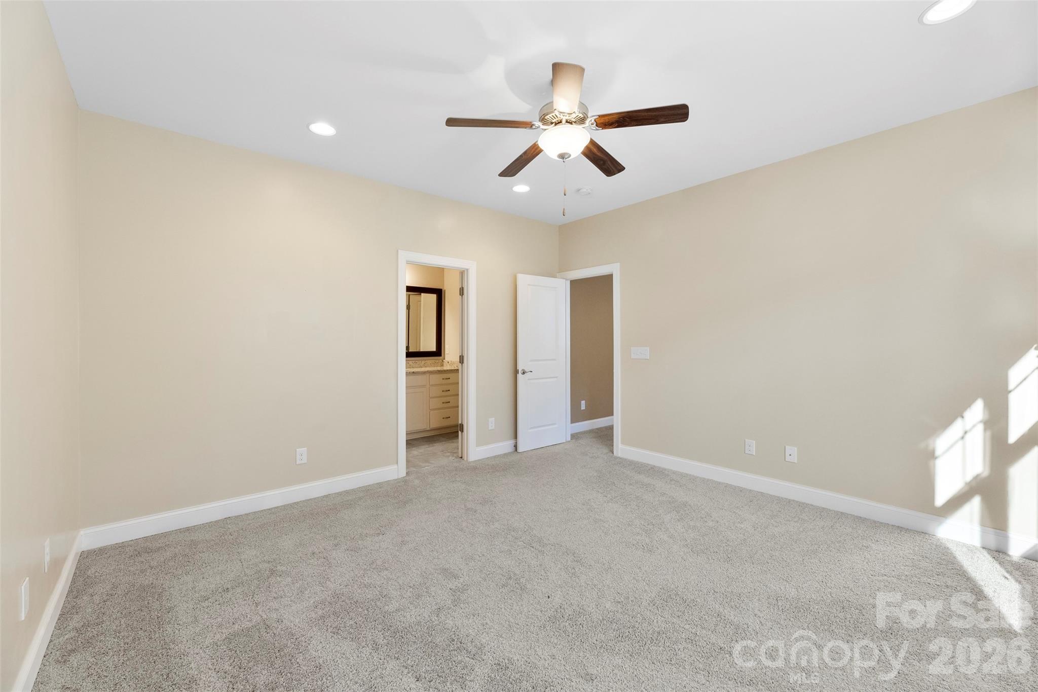 6065 Chimney Bluff Road Lancaster, SC 29720 - Photo 32 of 43 a view of an empty room with a window