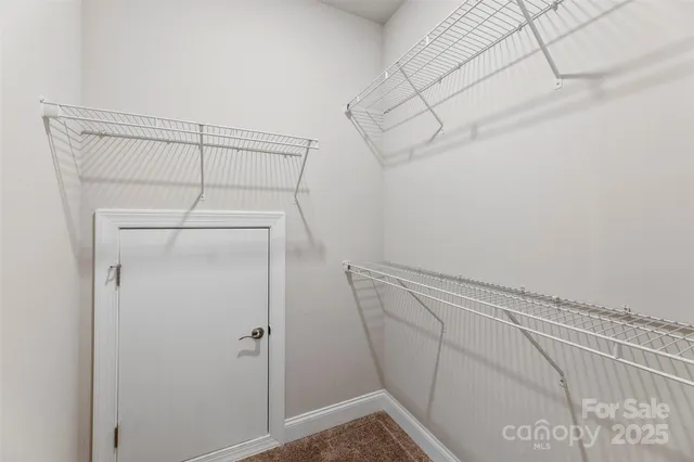 a living room with a fireplace and a table