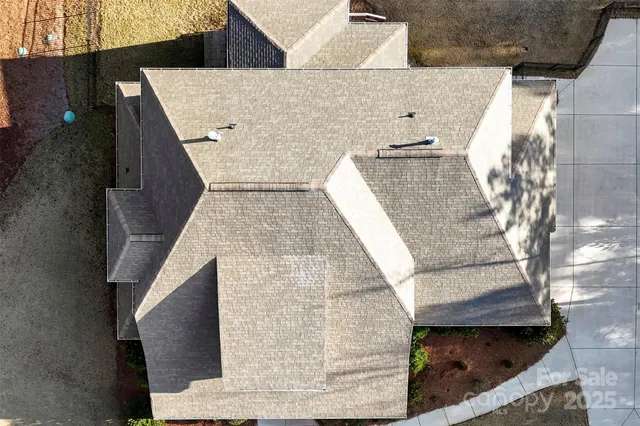 an aerial view of a house with a stairs