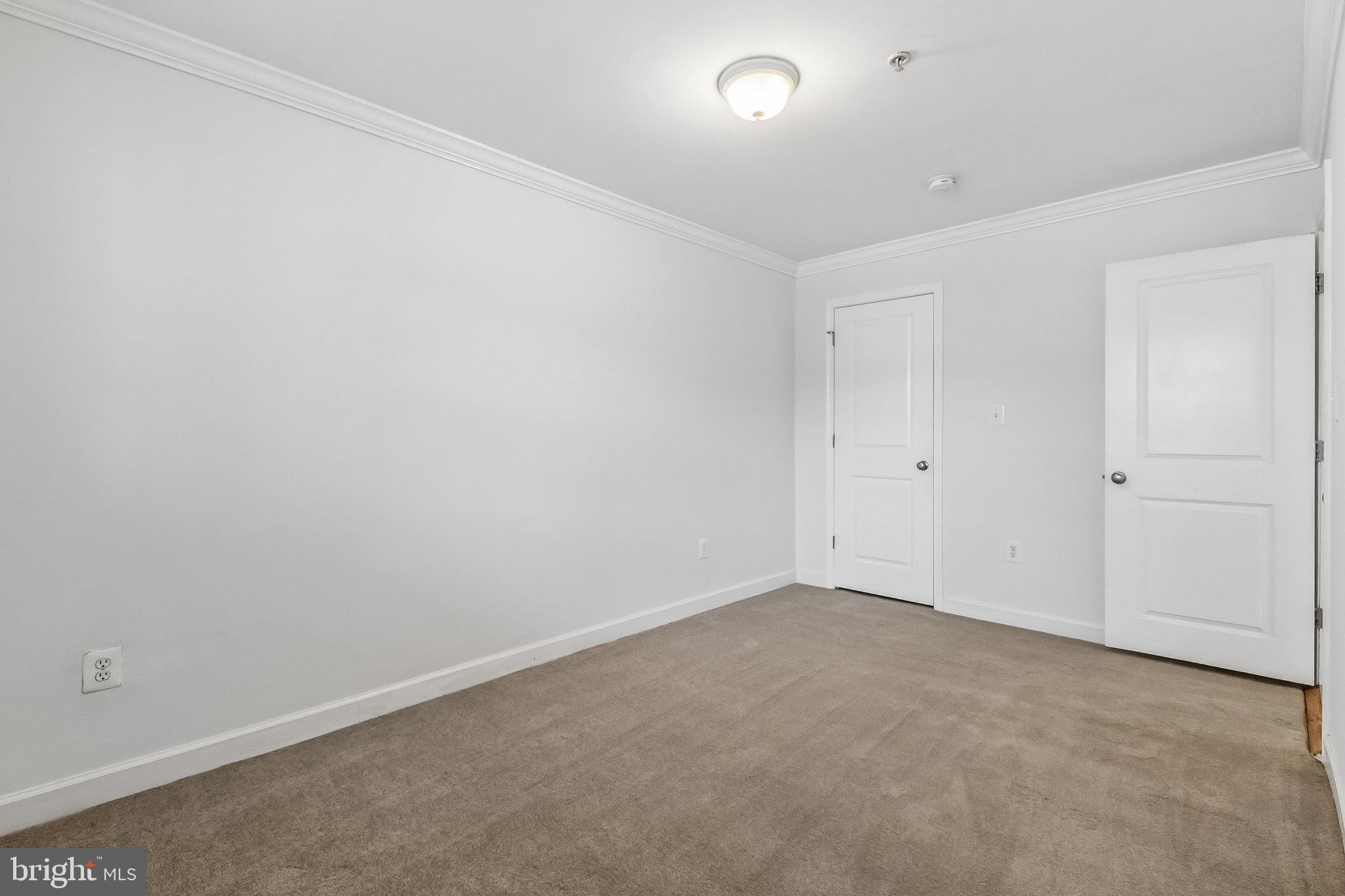 723 Longfellow Street Northwest, Unit 102 Washington, DC 20011 - Photo 13 of 17 an empty room with a empty space