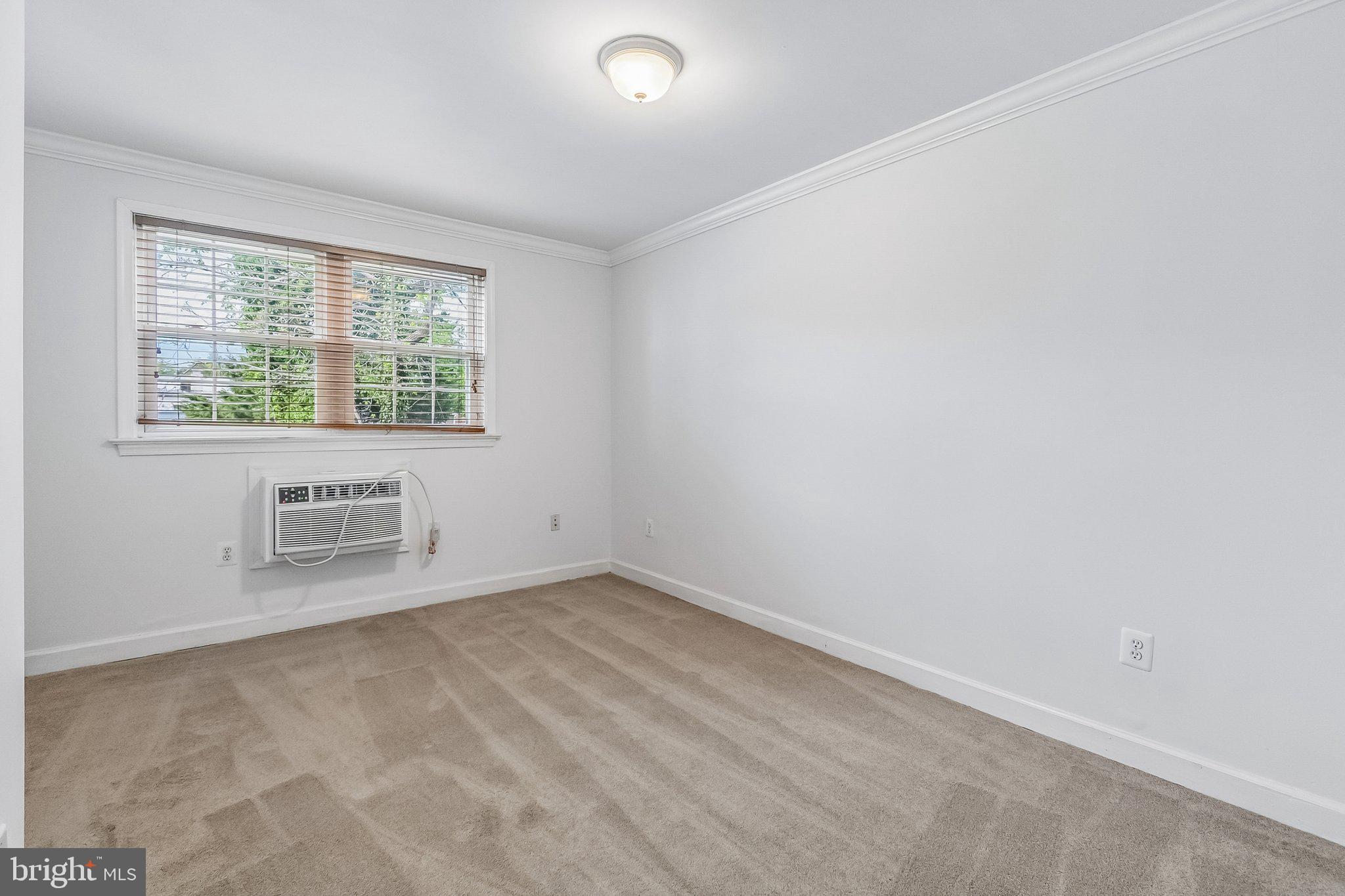723 Longfellow Street Northwest, Unit 102 Washington, DC 20011 - Photo 14 of 17 an empty room with a window