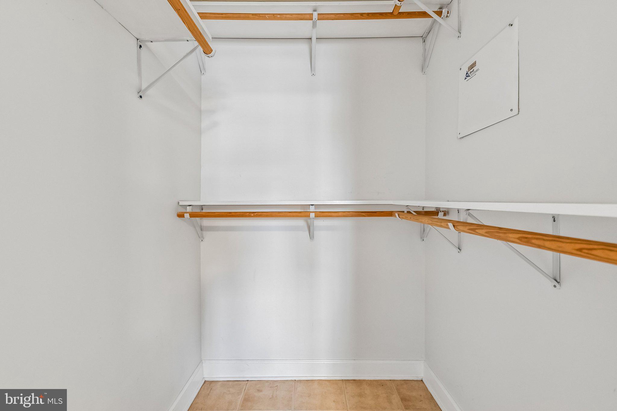 723 Longfellow Street Northwest, Unit 102 Washington, DC 20011 - Photo 15 of 17 a view of a room with racks on the wall