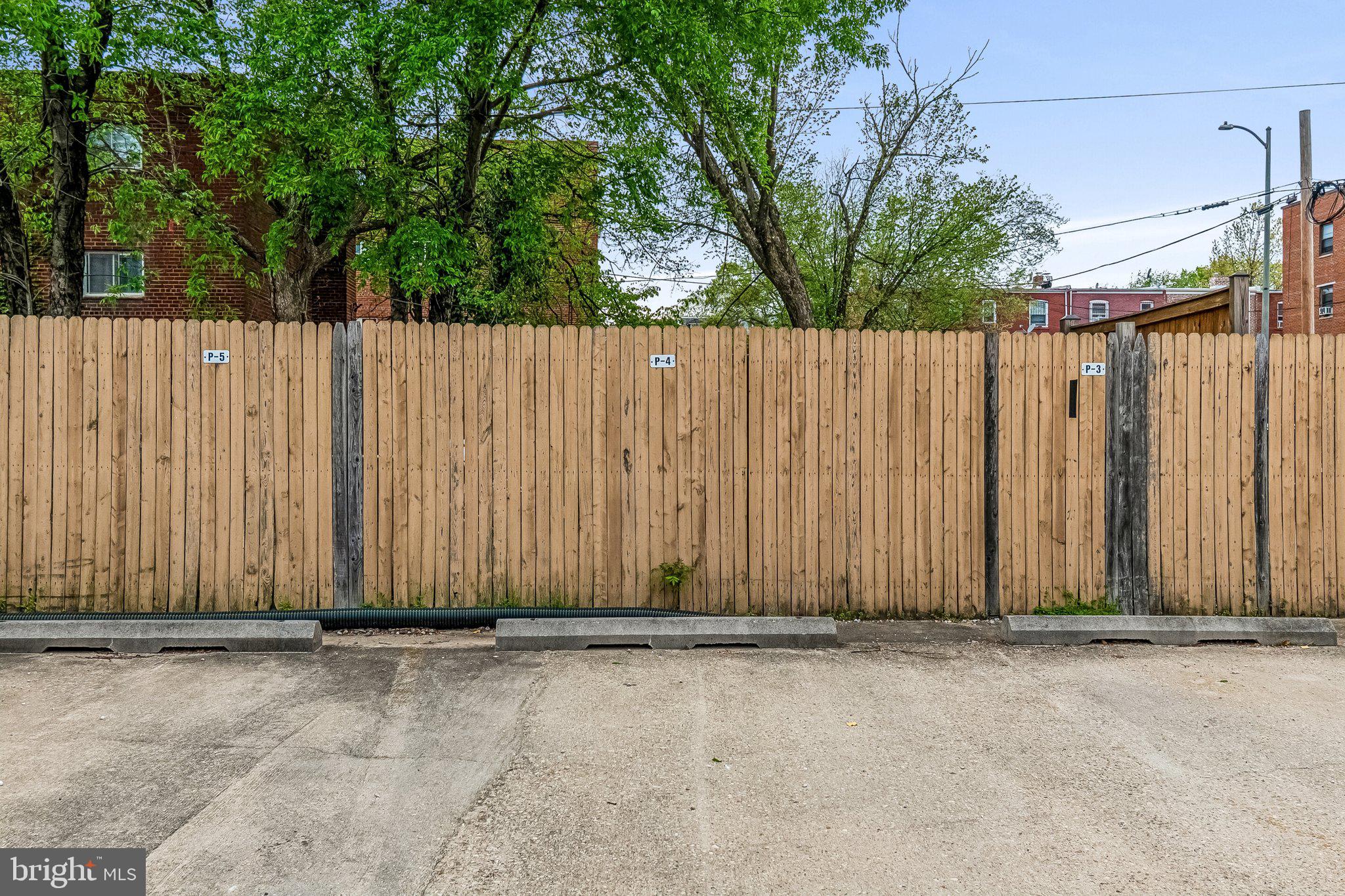 723 Longfellow Street Northwest, Unit 102 Washington, DC 20011 - Photo 16 of 17 a view of wooden fence