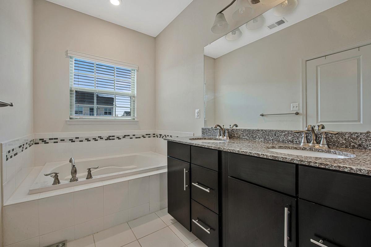 14413 Sandy Ridge Lane Laurel, MD 20707 - Photo 21 of 41 En-suite bathroom w/ dual-sink.