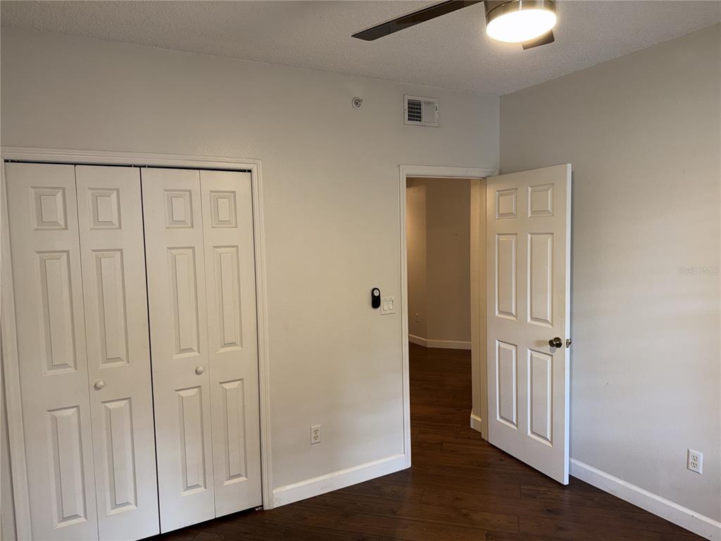 550 Cranes Way, Unit 116 Altamonte Springs, FL 32701 - Photo 12 of 29 an empty room with wooden floor
