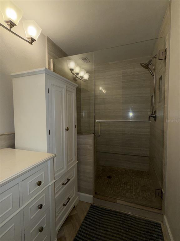 550 Cranes Way, Unit 116 Altamonte Springs, FL 32701 - Photo 26 of 29 a bathroom with a shower and a sink