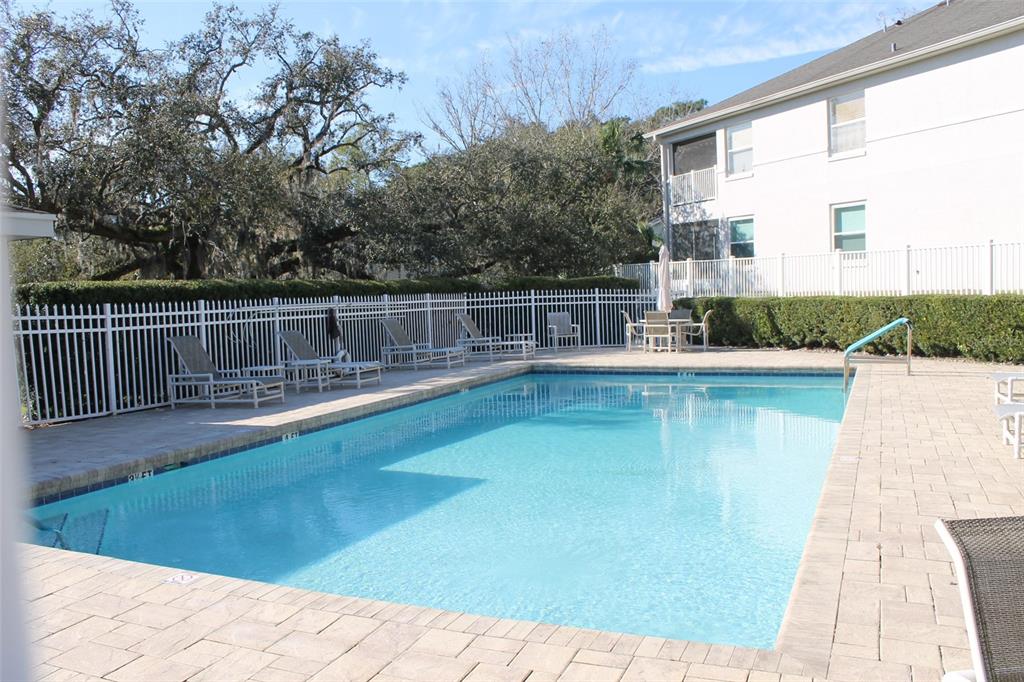 550 Cranes Way, Unit 116 Altamonte Springs, FL 32701 - Photo 29 of 29 a view of a swimming pool with a patio