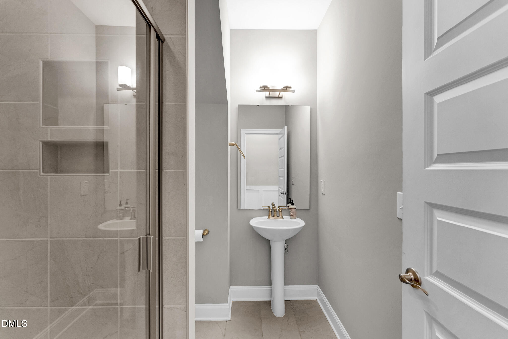 928 Barringer Drive Raleigh, NC 27606 - Photo 6 of 40 a bathroom with a shower