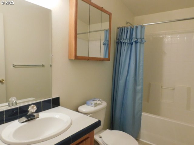 145 River Road Junction City, OR 97448 - Photo 24 of 35 a bathroom with a sink a toilet and shower
