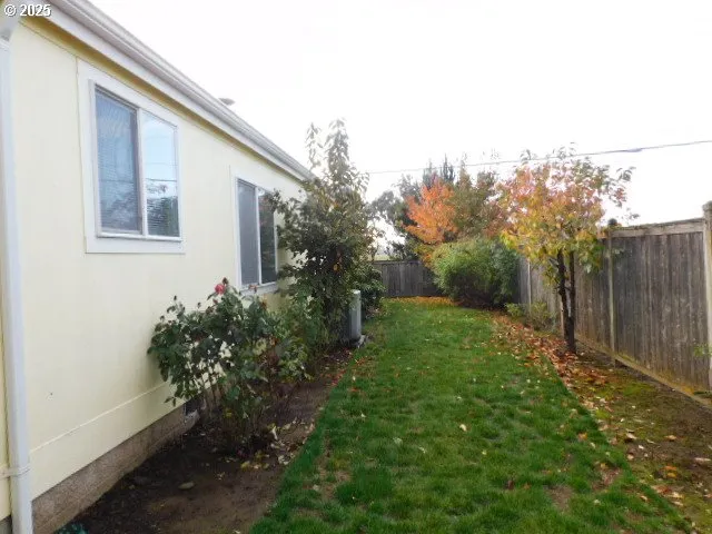 a backyard of a house with lots of green space