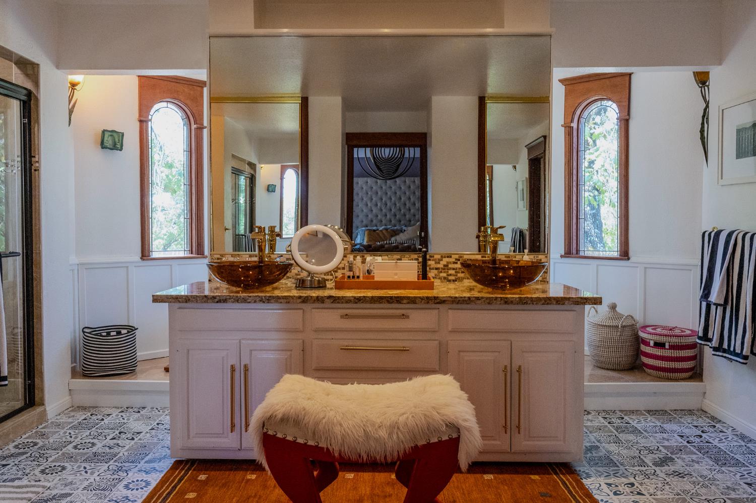 27689 Table Meadow Road Auburn, CA 95602 - Photo 32 of 72 a bathroom with a granite countertop sink a toilet and mirror