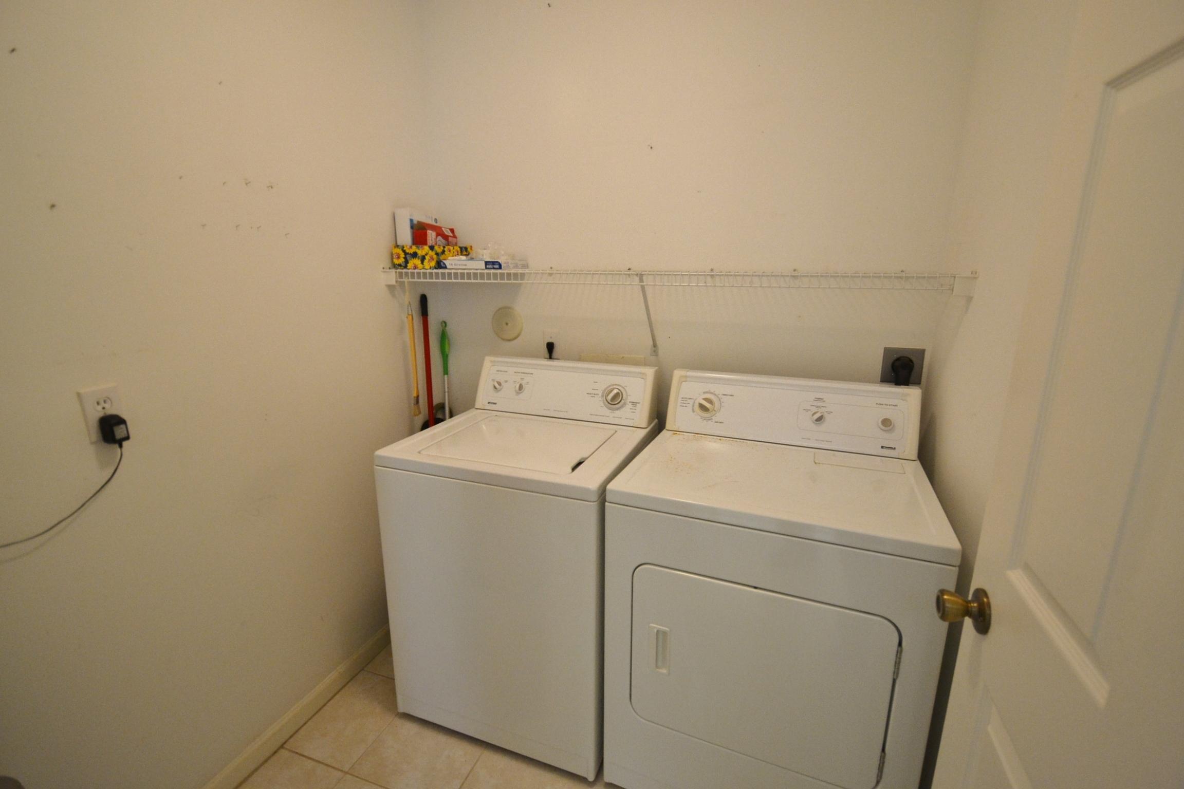 112 West Lee Road Delray Beach, FL 33445 - Photo 18 of 30 a utility room with dryer and washer