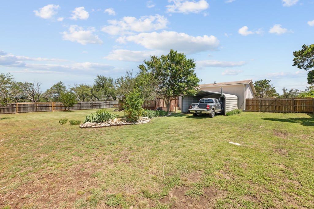 64 Quail Run Harper, TX 78631 - Photo 20 of 25 a house view with a lake view