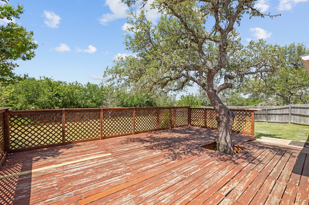 64 Quail Run Harper, TX 78631 - Photo 21 of 25 a view of a wooden deck