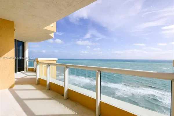 a view of balcony with ocean view