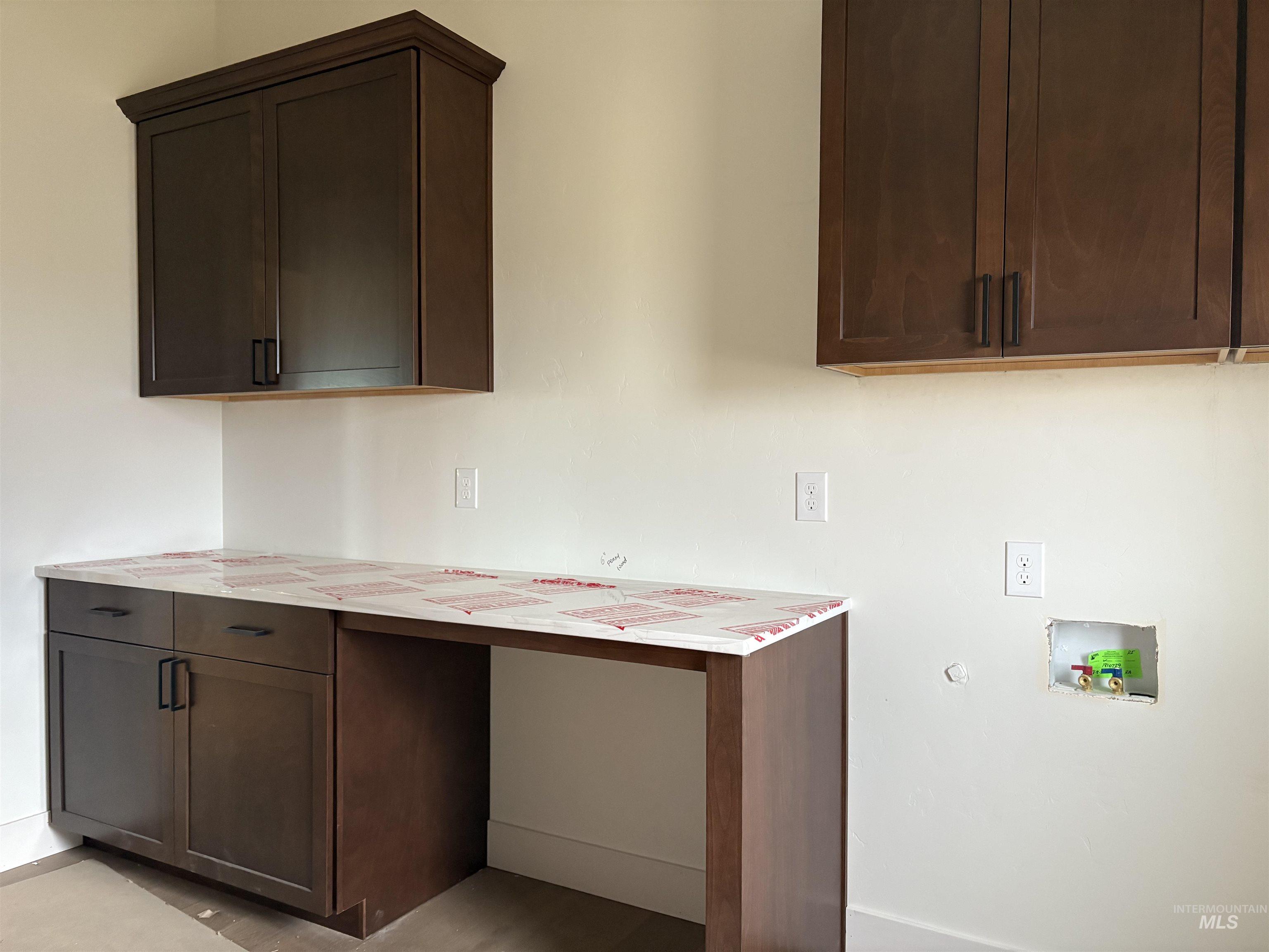 6431 Raptor Ridge Lane Melba, ID 83641 - Photo 11 of 12 Laundry room featuring washer hookup and baseboards